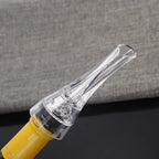 Clear wine aerator pourer spout with black gasket and angled pouring tip