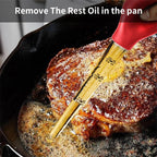 Yellow meat injector tube with red handle and angled needle in a skillet
