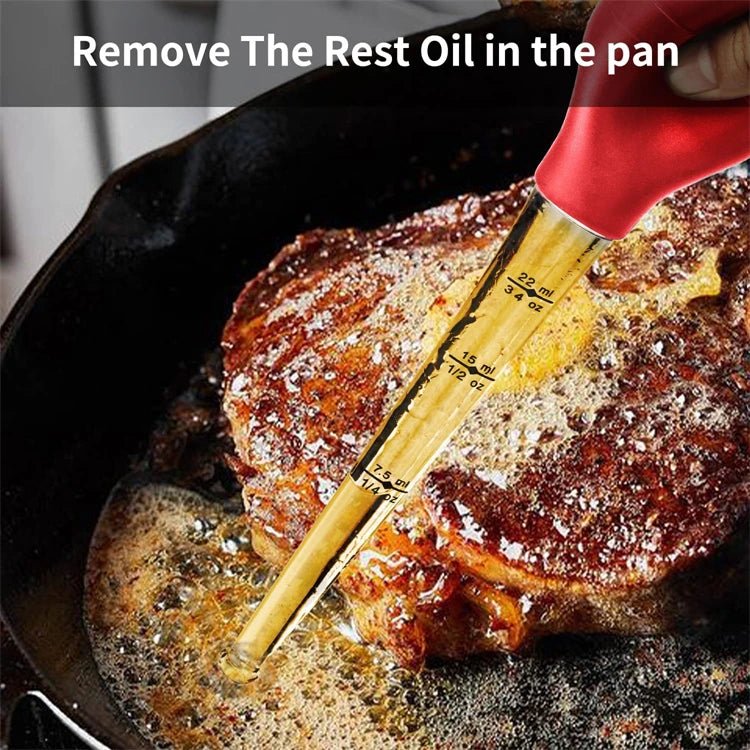 Yellow meat injector tube with red handle and angled needle in a skillet