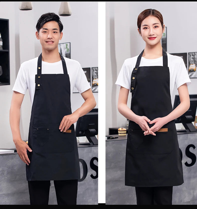 Black waterproof canvas chef apron with front pockets and adjustable neck