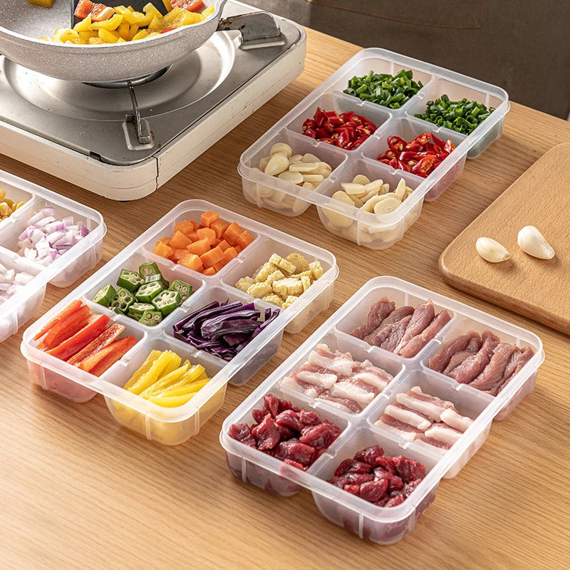 Clear multi-compartment food storage box with 6 compartments for refrigerator prep.