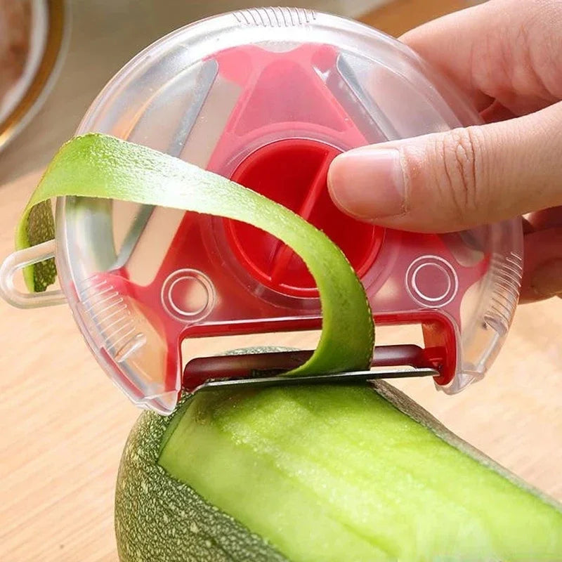 3-in-1 rotary vegetable peeler cutting green cucumber strips with rotating blades