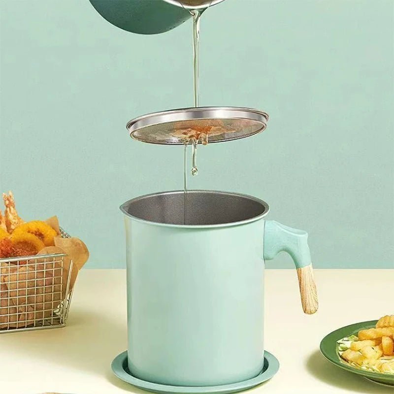 Light green grease container with fine mesh strainer under pouring cooking oil