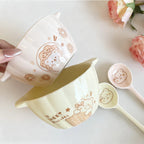 Yellow ceramic serving bowl with handle and matching spoon, sweet bear and star print