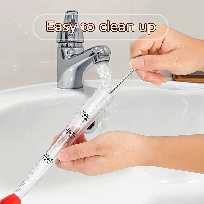 Marinade injector with silicone bulb head, being rinsed with stream of water