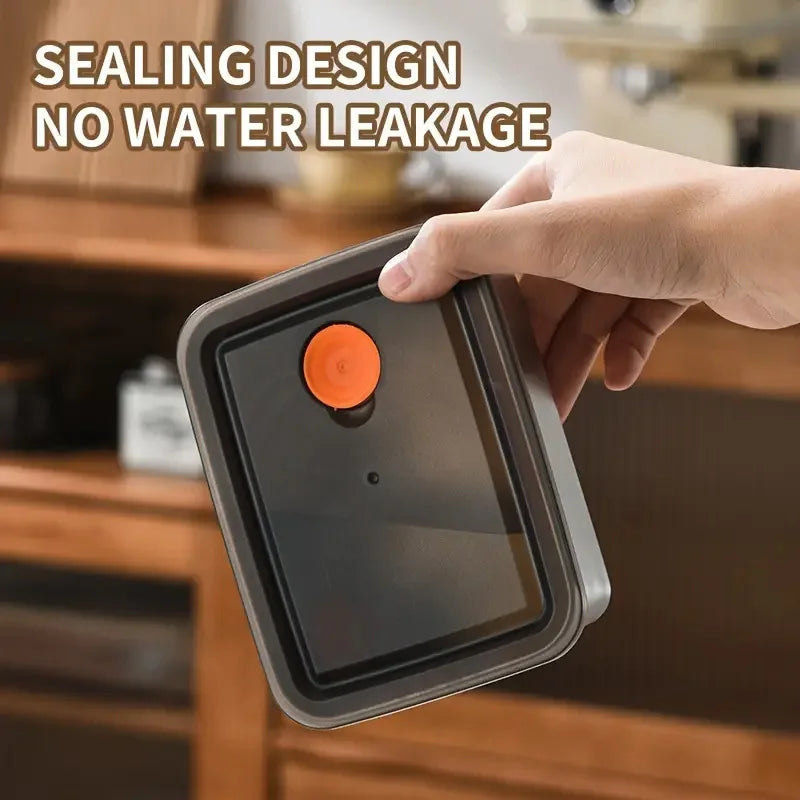 Stainless steel container with vented lid being closed by hand for secure sealing