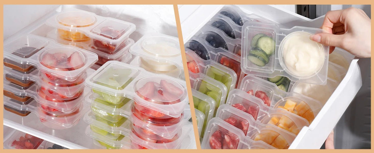 Filled double-compartment snack containers in organizer, clear lids with visible portions