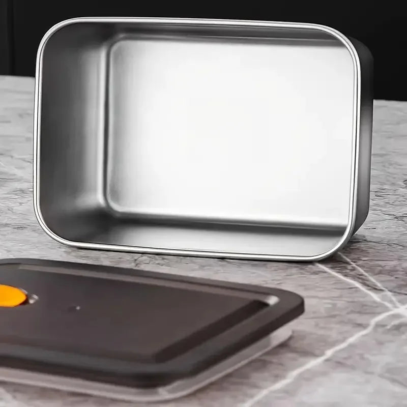 Rectangular stainless steel food storage container with vented lid, empty