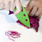 Green herb leaf stripper with curved blade and perforated 8-hole head