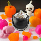 Black cauldron candy bowl with handle and round opening, textured finish