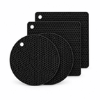 Black silicone trivet mats set with hex texture, stacked pads, and hanging holes