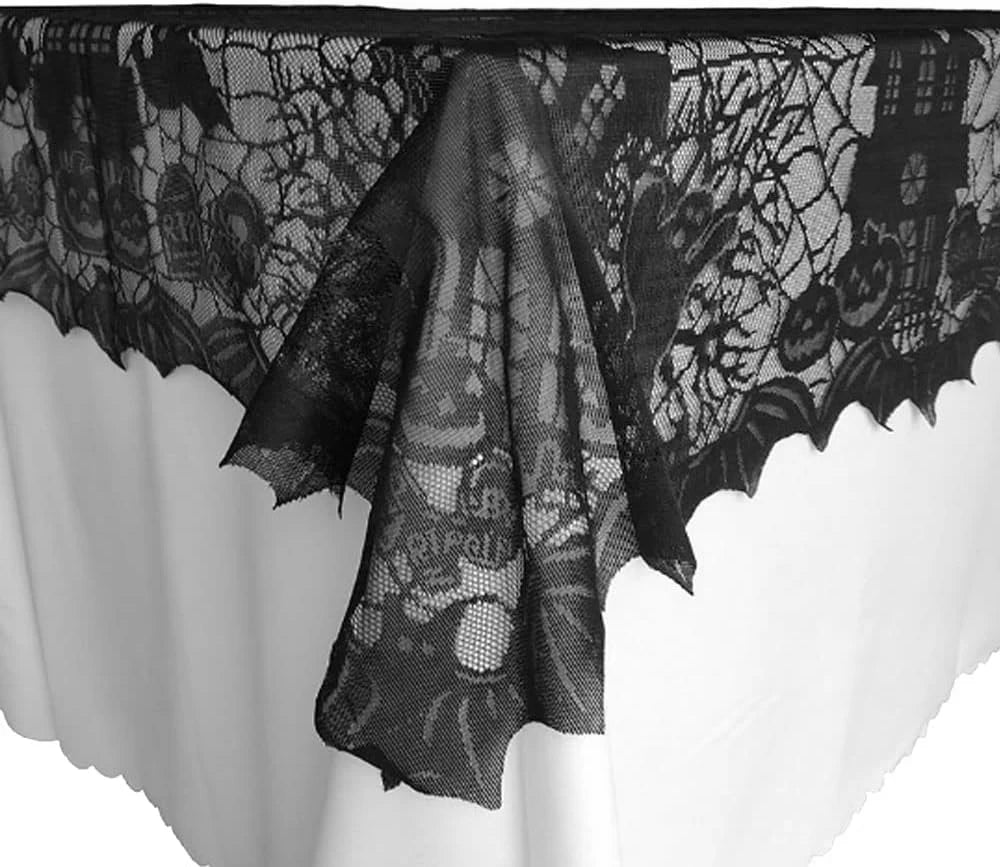 Black lace table runner with spider-web design and scalloped hanging hem