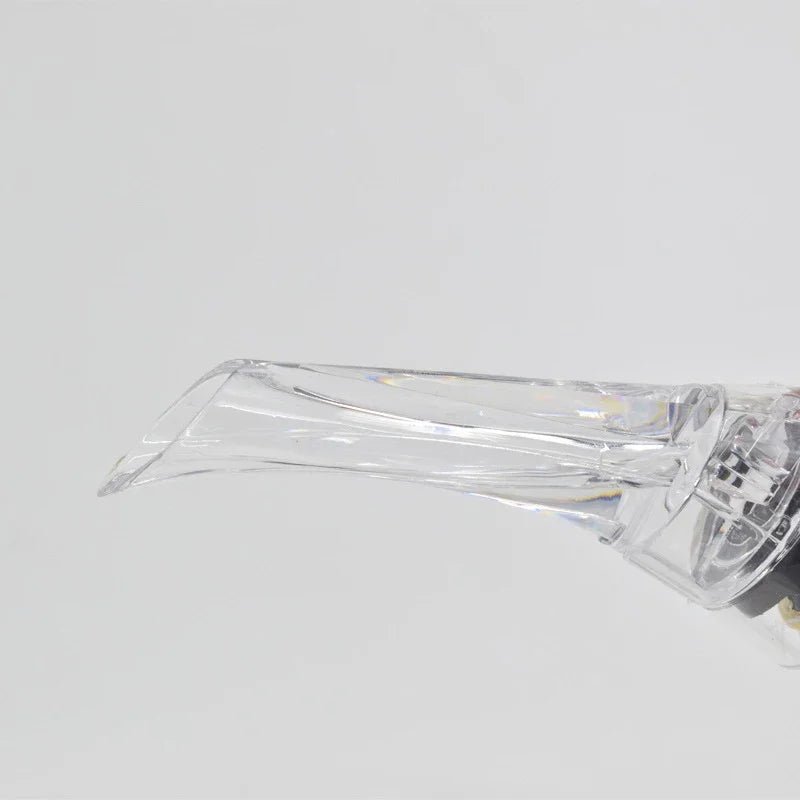 Wine aerator pourer spout with clear outlet, showing internal aerator channels