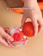 3-in-1 rotary vegetable peeler held in hand over a tomato, showing blade head