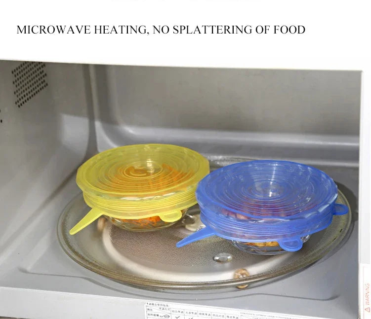Yellow and blue silicone stretch lids inside microwave over dishes