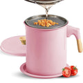 Pink grease container with fine mesh strainer and lid, wood-style handle