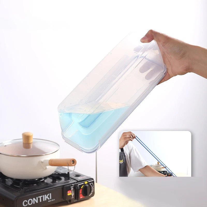 Hand opening a clear bread storage box with blue silicone-seal lid