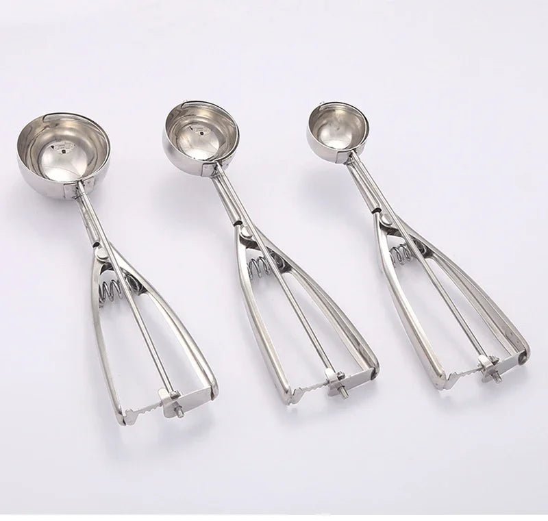 Spring-loaded stainless steel ice cream and cookie scoop with double-prong release