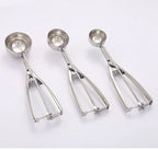 Spring-loaded stainless steel ice cream and cookie scoop with double-prong release