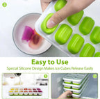 Green silicone ice cube tray with lid on circular plate, with molded cube compartments