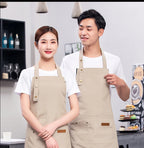 Khaki tan waterproof canvas chef apron with adjustable neck and large front pockets