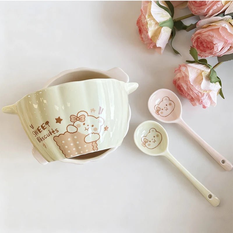 Cream ceramic pumpkin-shaped bowl with handle spoon, bear faces and star accents