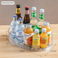 Fully transparent oval 360° rotating drink organizer turntable with bottle slots