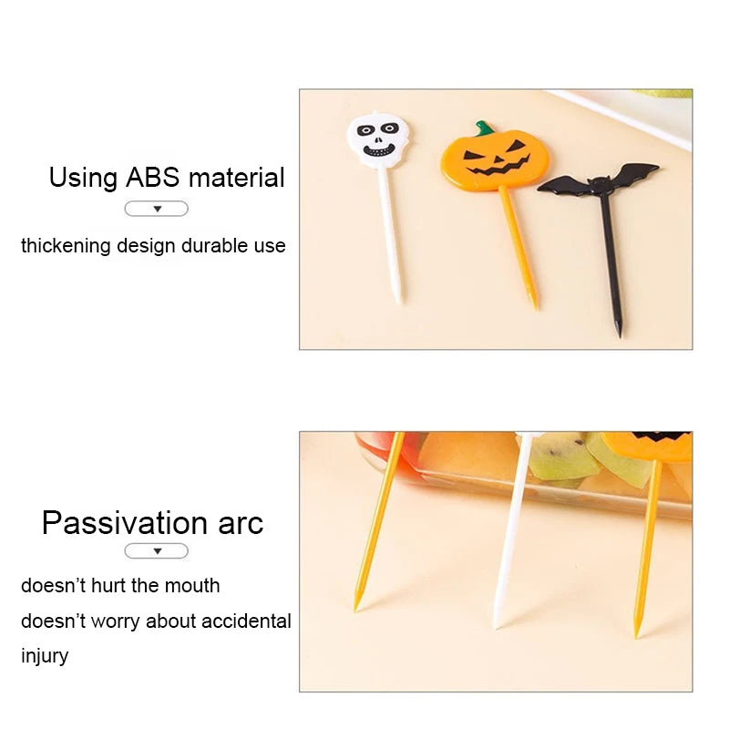 Close-up of Halloween cupcake topper picks with molded pumpkin, ghost and bat decorations