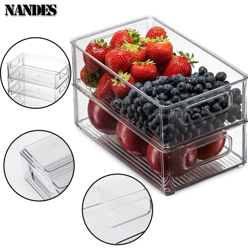 Clear refrigerator bin with built-in handles holding strawberries and blueberries