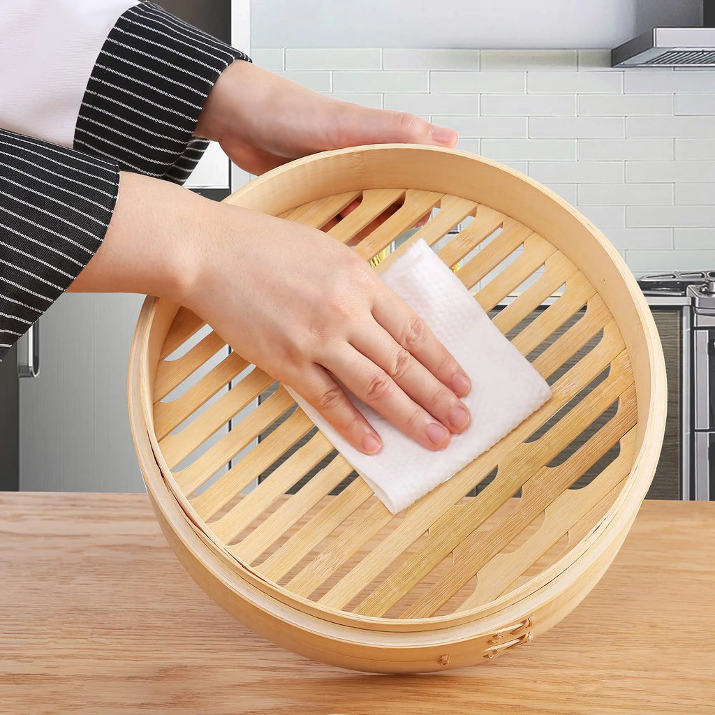 Natural bamboo steamer basket with round bamboo slat base, open top