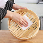 Natural bamboo steamer basket with round bamboo slat base, open top