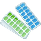 Stackable silicone ice cube trays with transparent lids in mint green and sky blue