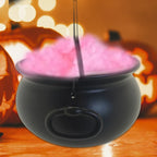 Black cauldron candy bucket filled with pink candy, hanging hook in center