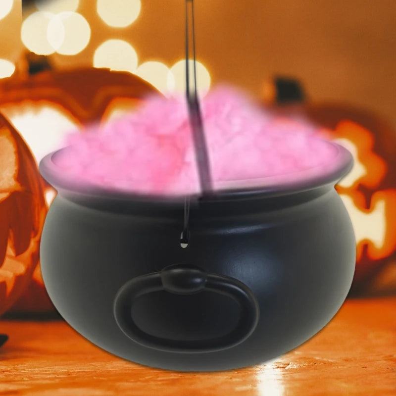 Black cauldron candy bucket filled with pink candy, hanging hook in center