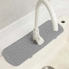 White silicone sink splash guard and drain mat with adjustable faucet openings