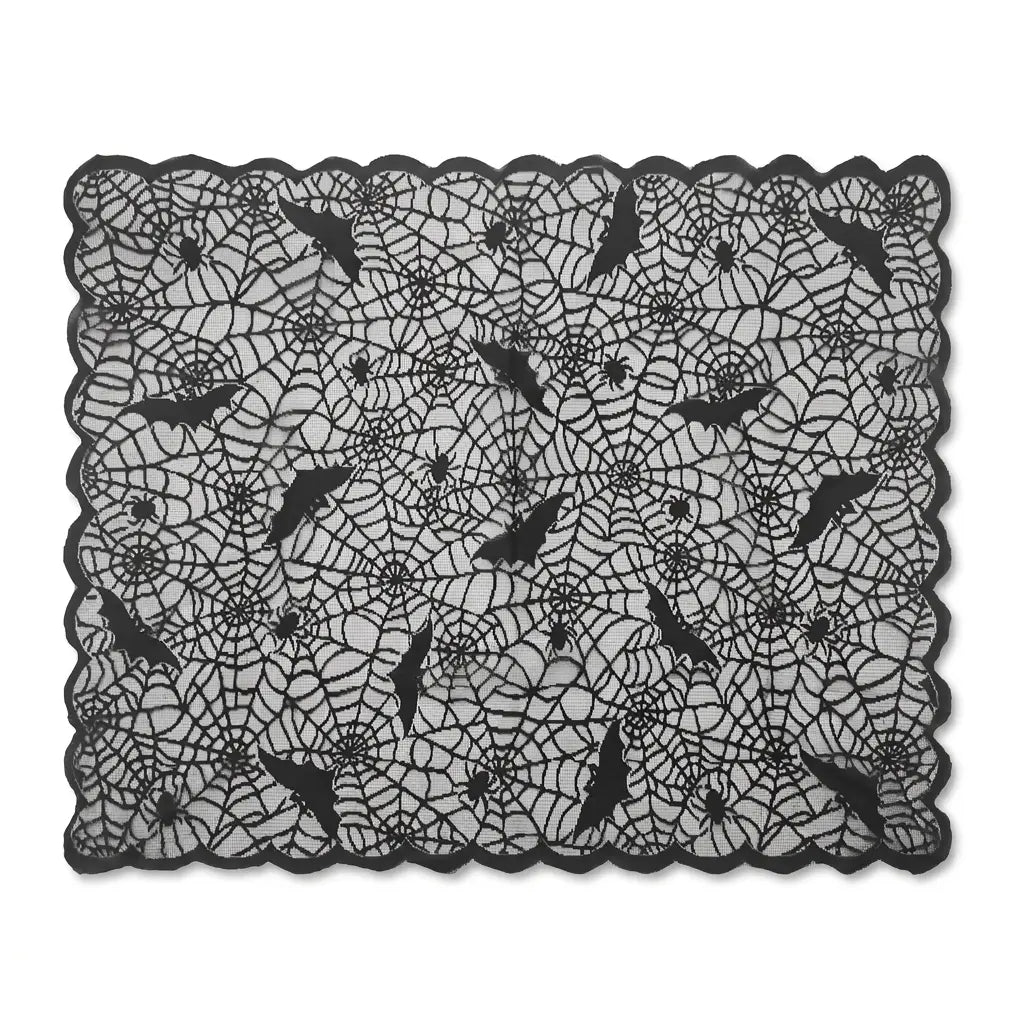 Black lace Halloween tablecloth with spider web pattern, bats, and spiders on white background.