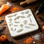Square-ish silicone sugarcraft mold featuring molded Halloween hands and arms