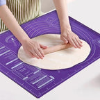Purple silicone pastry mat with concentric measurement rings and guide icons