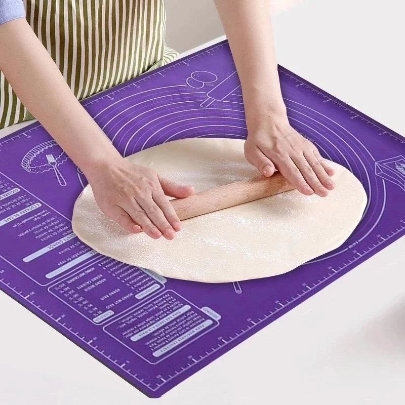 Purple silicone pastry mat with concentric measurement rings and guide icons