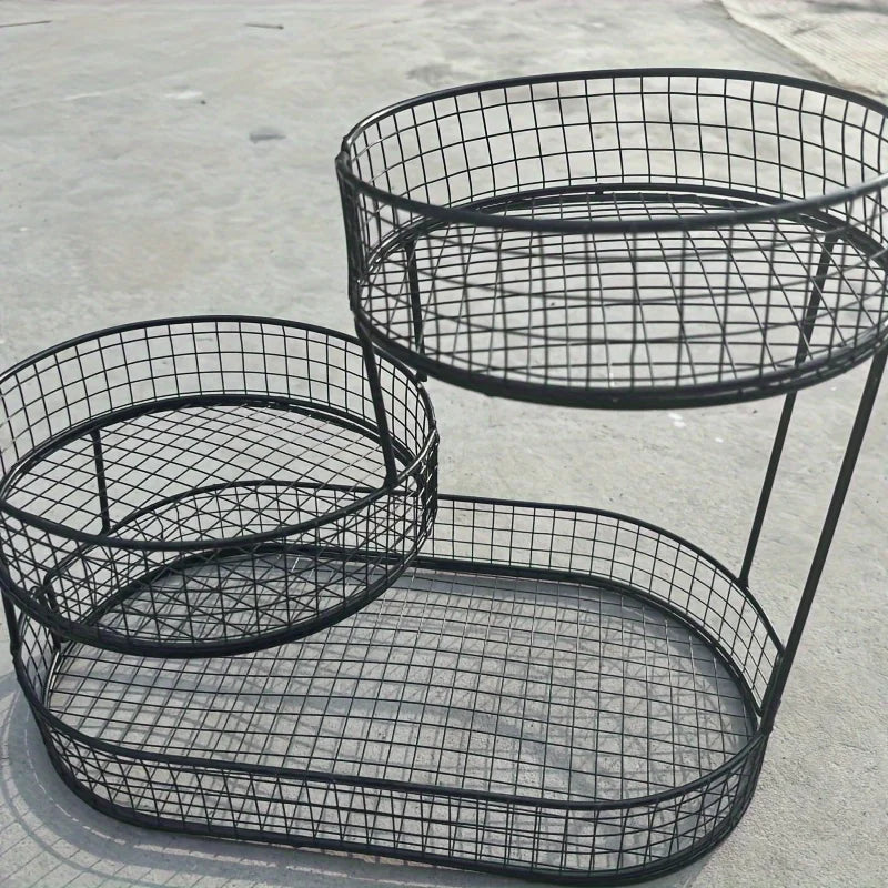 Set of round black wire baskets with curved frames and grid bottoms