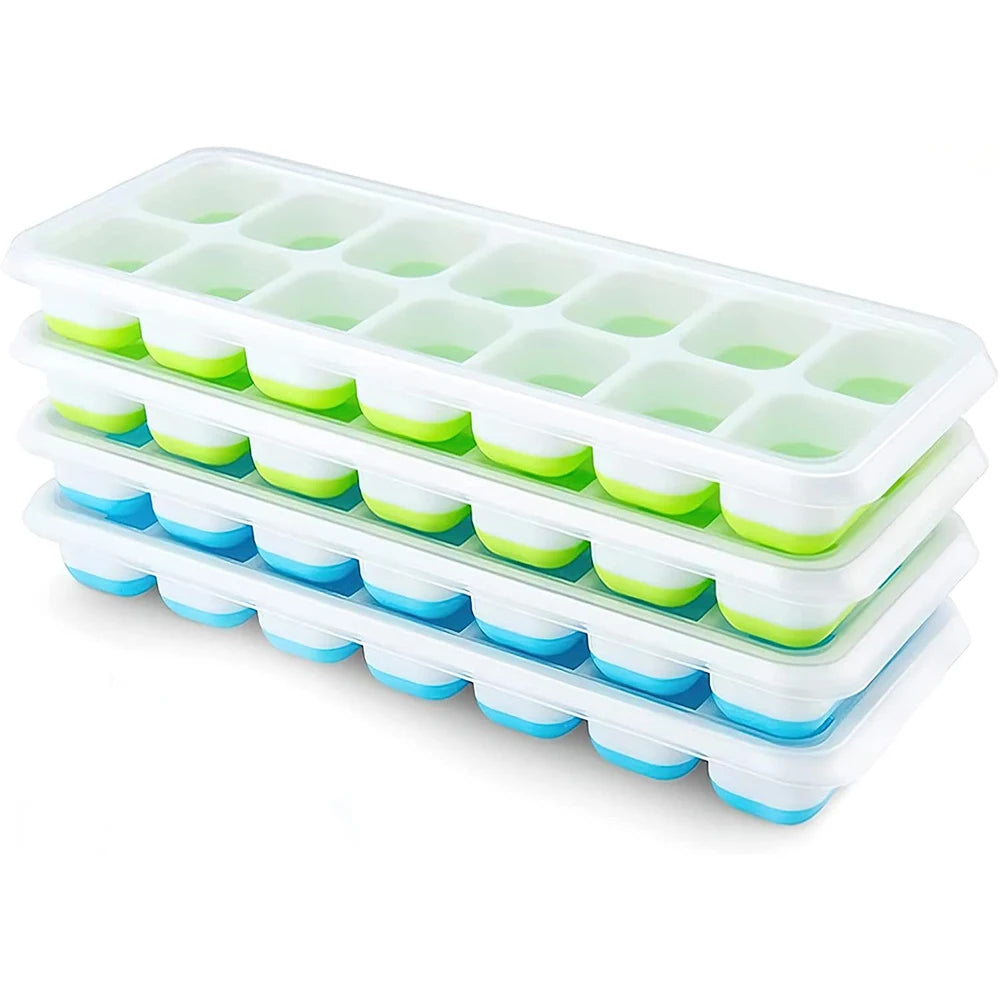 Stacked ice cube trays with mint green and light blue cavities, white spill-resistant lids