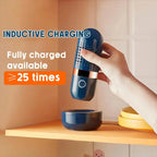 Blue portable wireless food purifier with charging base; hand holds the device
