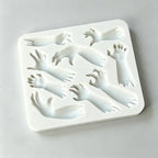 Silicone sugarcraft mold with molded hands and arms for Halloween treats