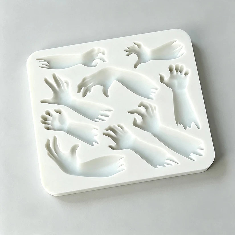 Silicone sugarcraft mold with molded hands and arms for Halloween treats