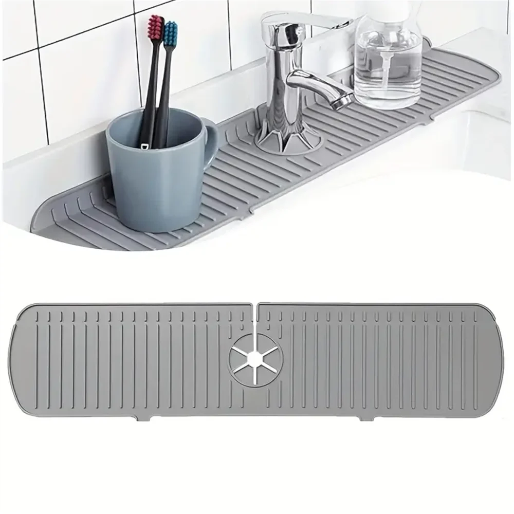 Gray silicone sink splash guard drain mat with toothbrush holder and molded grooves