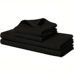 Black waffle weave kitchen towels stack folded for storage