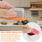 Stainless steel snack cup with orange leakproof silicone lid
