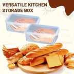 Two clear bread storage boxes with blue lids and airtight seals, filled with bread and rolls
