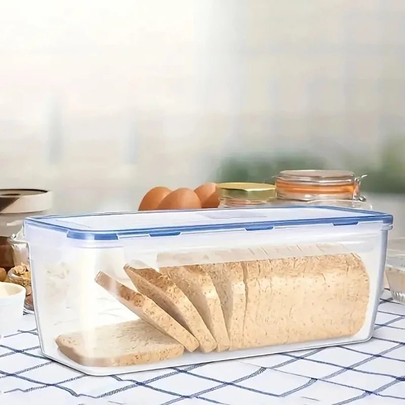 Clear plastic bread storage box with blue airtight silicone-seal lid, holding sliced loaves