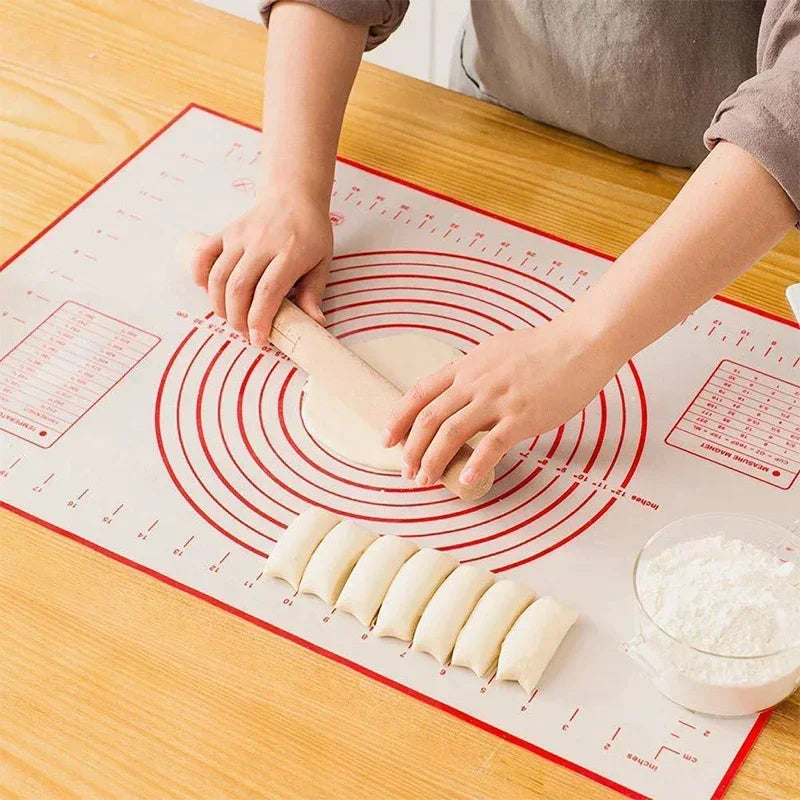 Red-edged silicone dough mat with concentric ring lines for shaping pastries